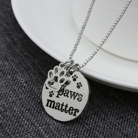 Image of cat necklace, rescue cat, rescue cat necklace, all paws matter, paws, dog necklace